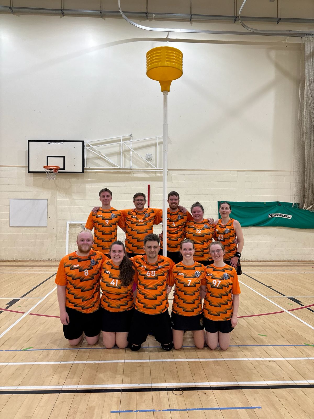 Newport Centurions Away Kit - Orange striped korfball uniform